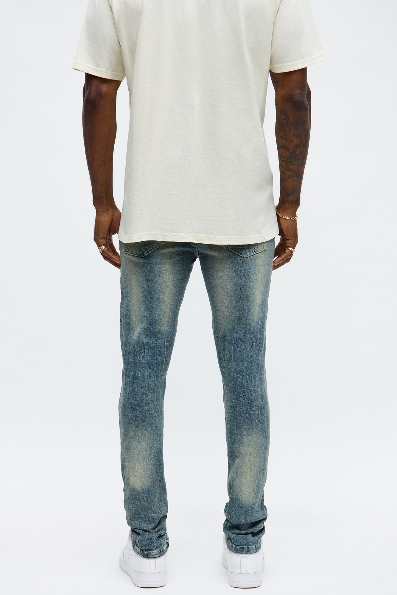 Skinny Paneled And Distressed Jean - Medium Blue Wash