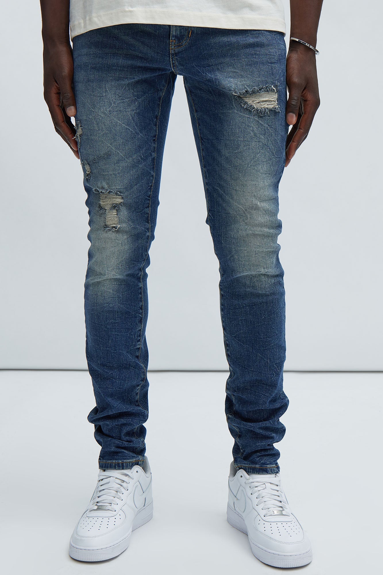 Primary Distressed Stacked Skinny Jeans - Dark Wash