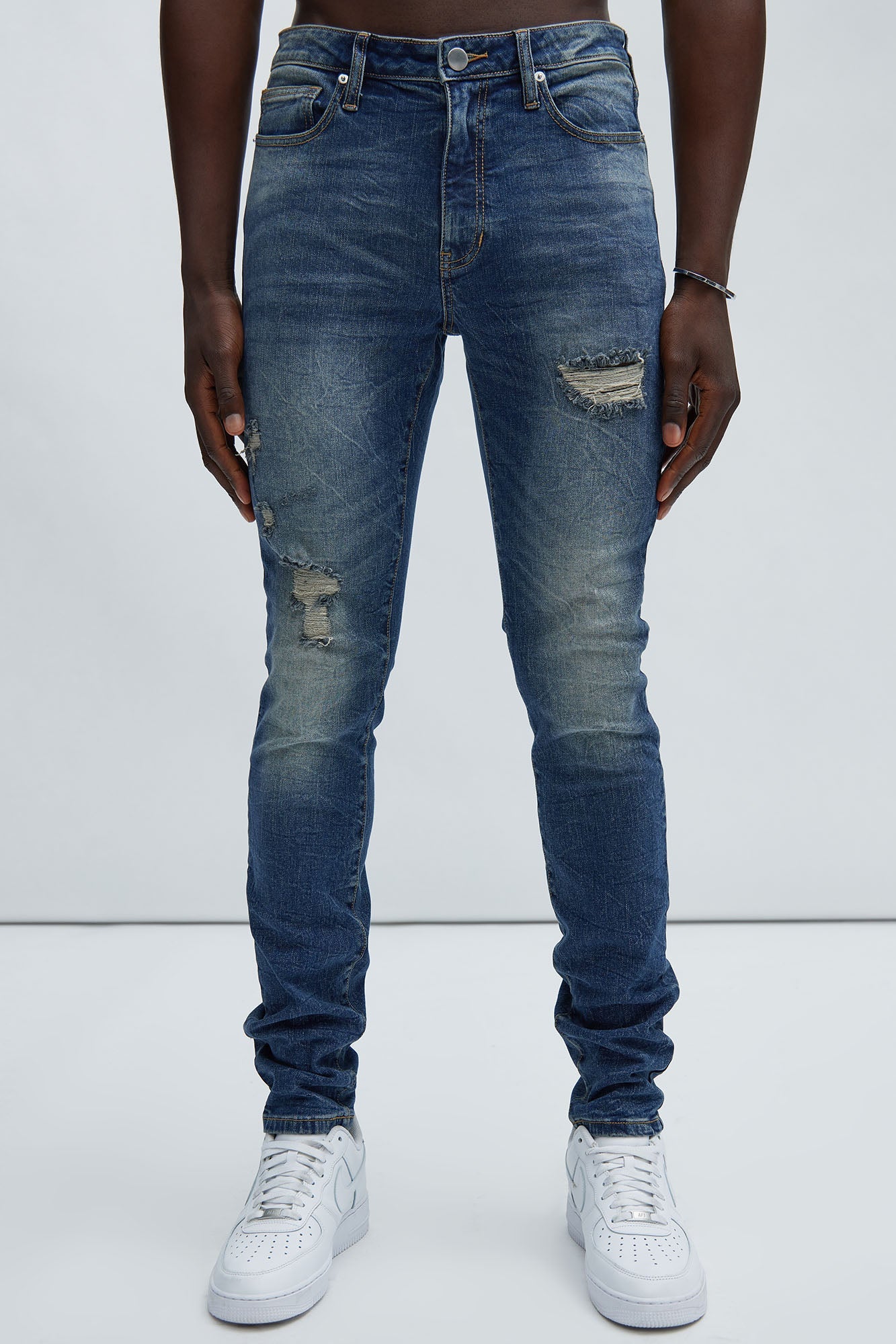 Primary Distressed Stacked Skinny Jeans - Dark Wash