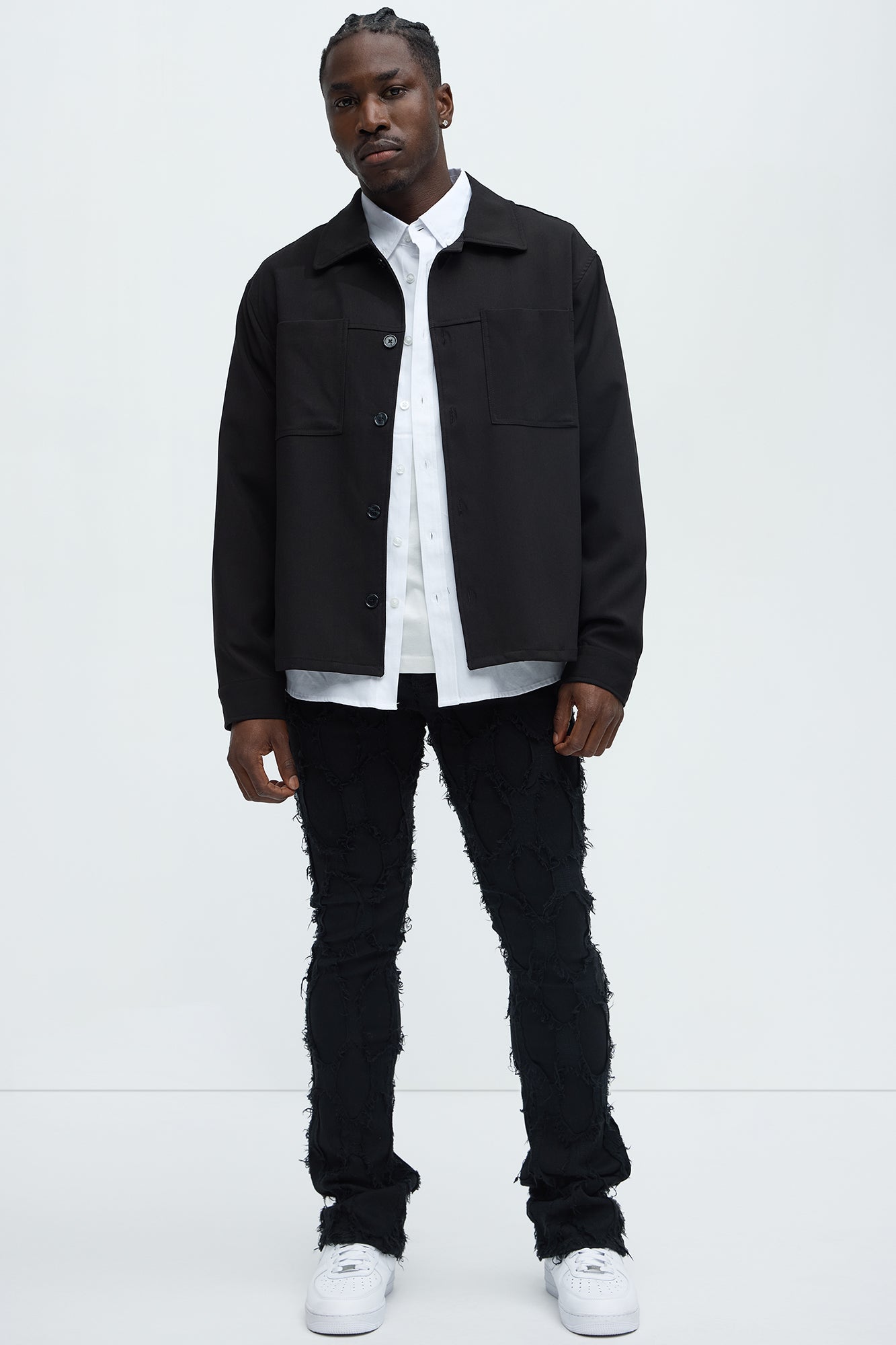 Shredded Distressed Stacked Skinny Flare Jeans - Black