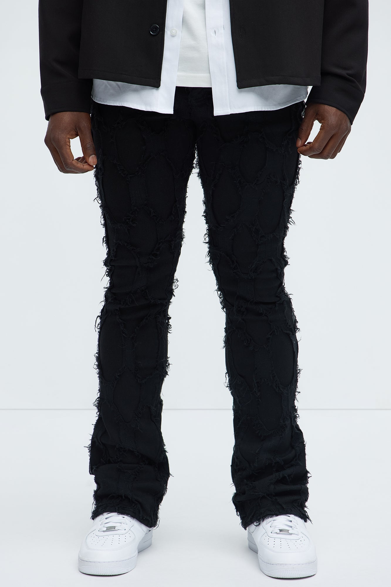 Shredded Distressed Stacked Skinny Flare Jeans - Black