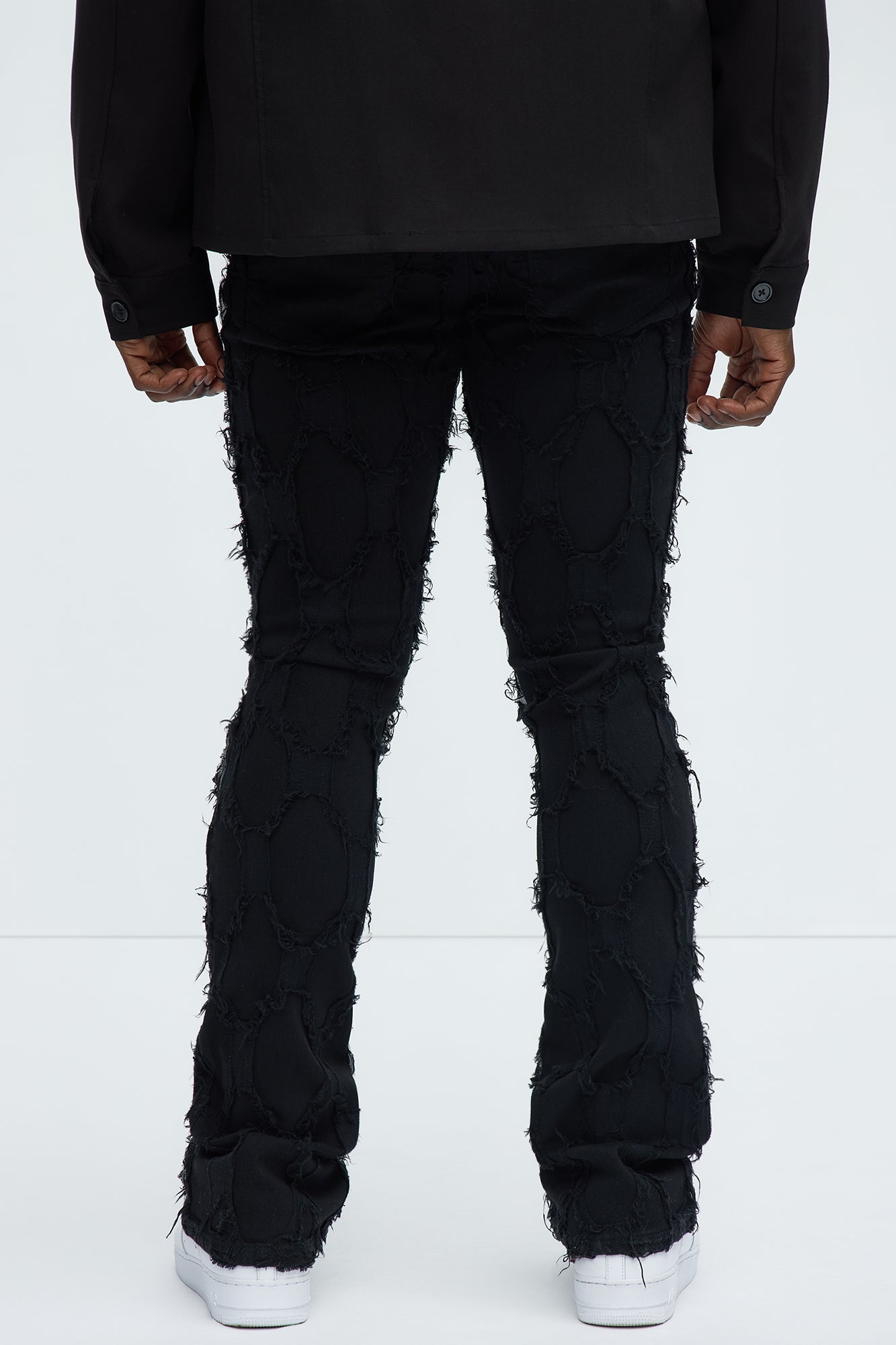 Shredded Distressed Stacked Skinny Flare Jeans - Black
