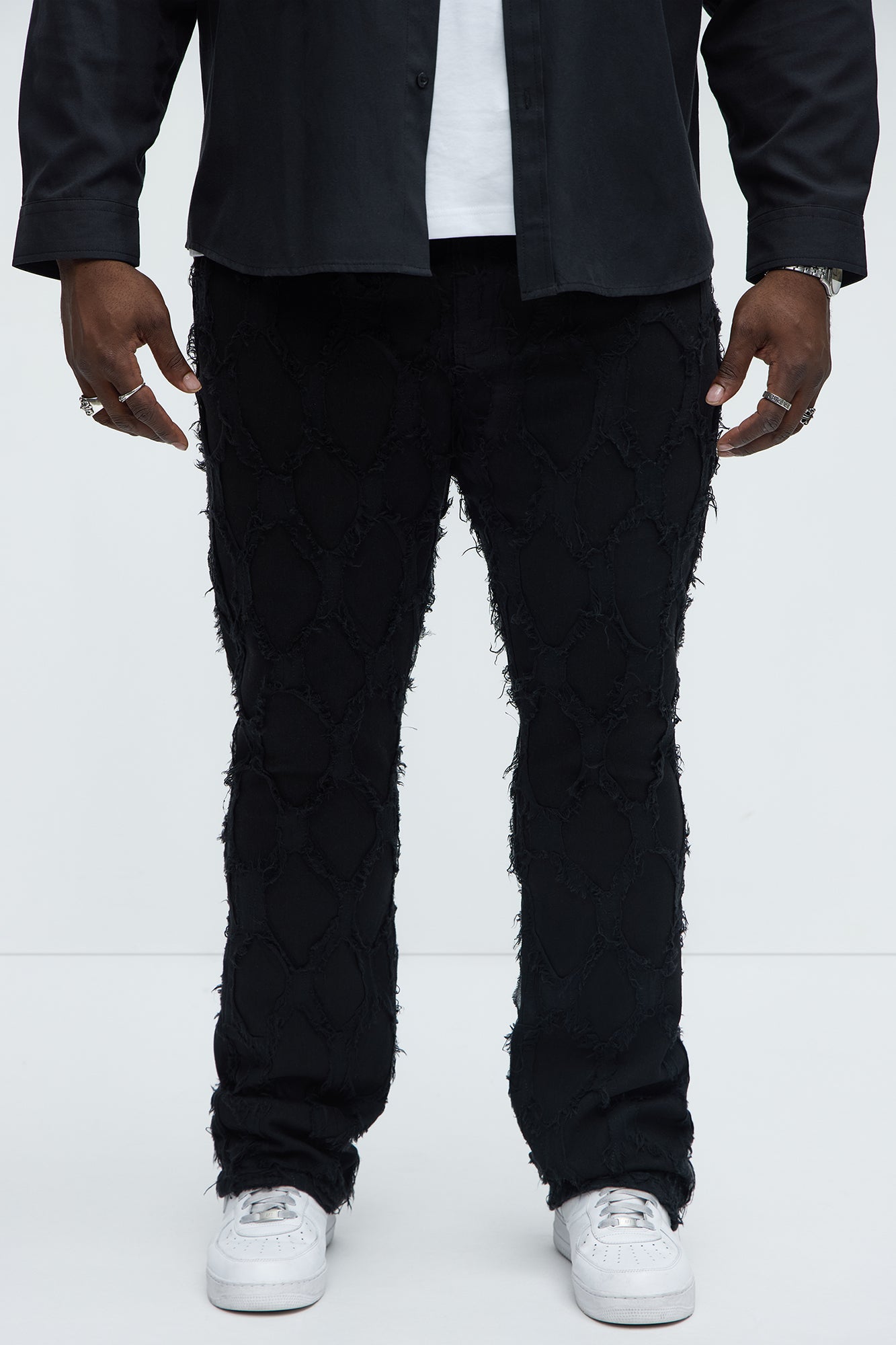 Shredded Distressed Stacked Skinny Flare Jeans - Black