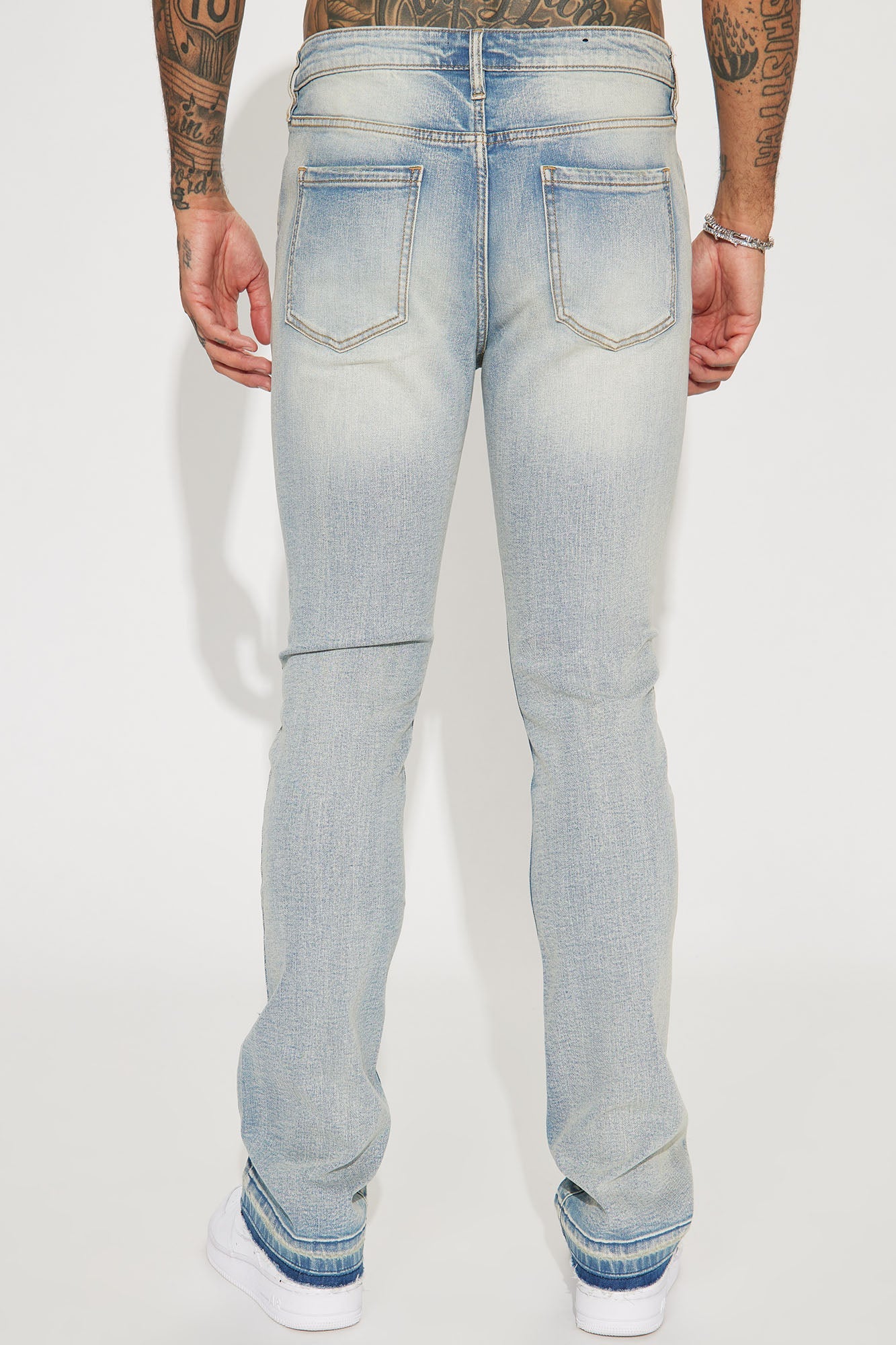 Torn Apart Stacked Skinny Flare Jeans - Light Blue Wash