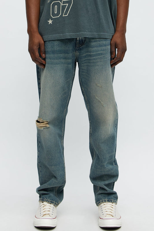 Keep You Guessing Distressed Slim Jeans - Medium Blue Wash