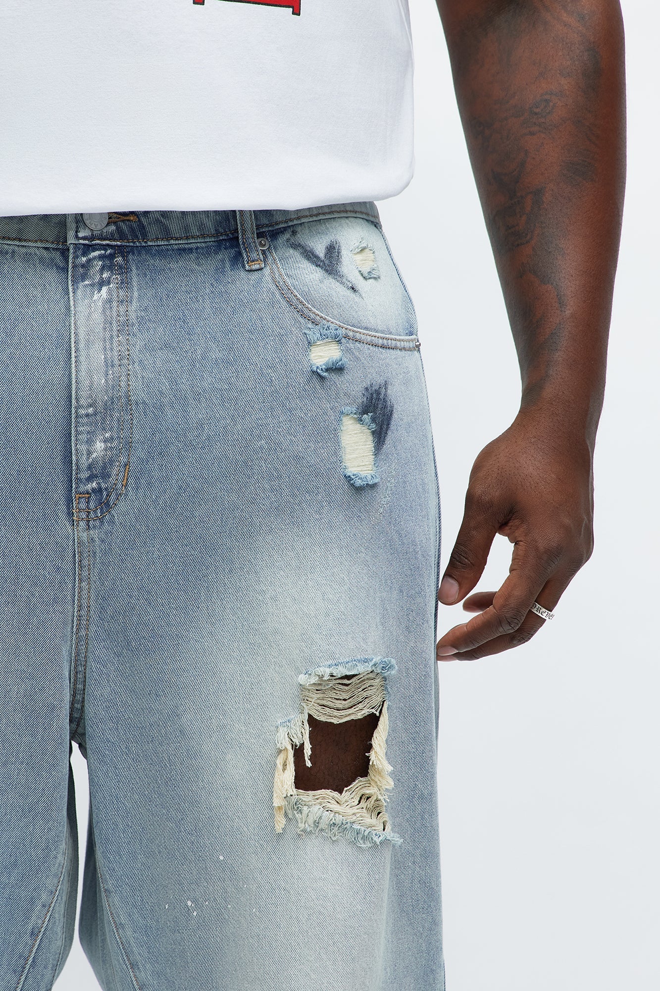 Baggy Battle Scars Distressed Jeans - Light Blue Wash