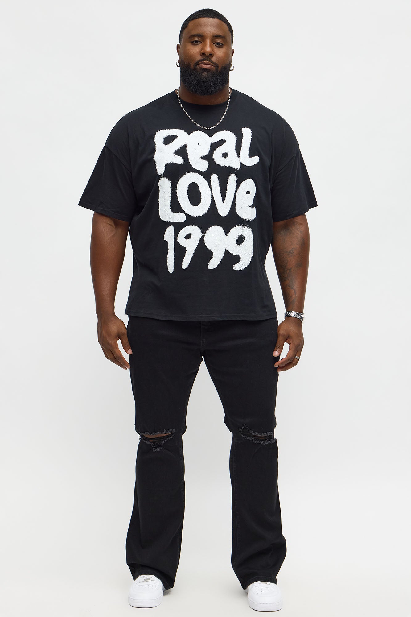 Stacked Skinny Flare Just Enough Distressed Jean - Black