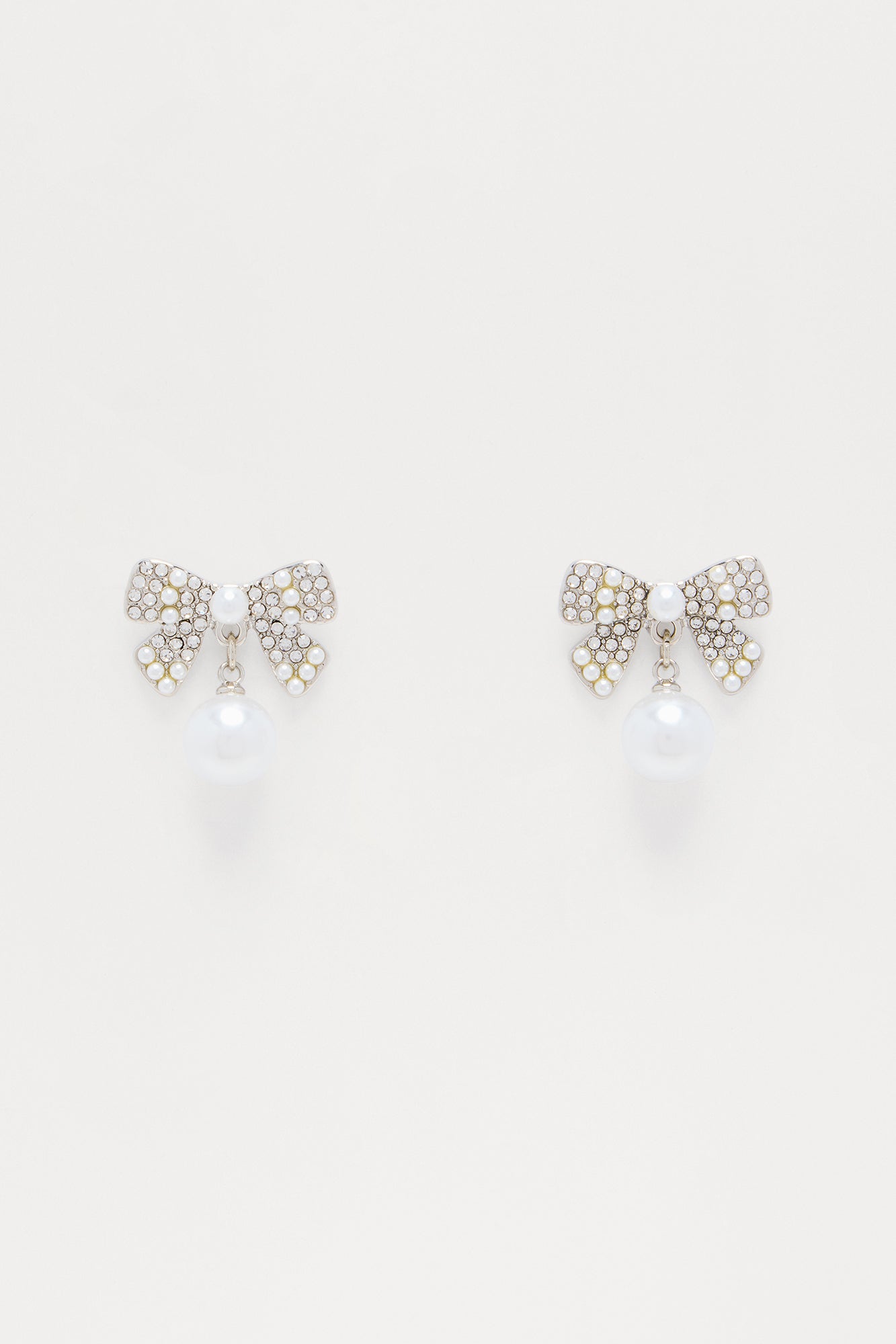 Gracefully Tied Bow Drop Earrings - Silver