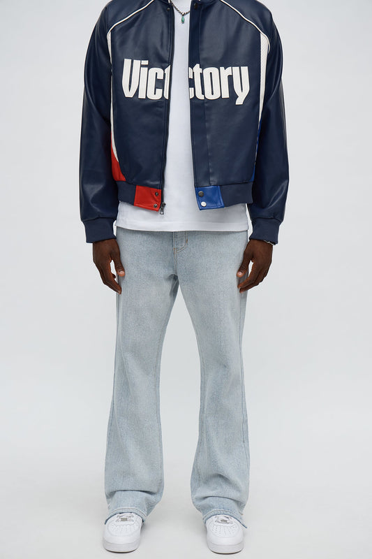 Stacked Slim Flare Slit Jacquard Jean - Light Blue Wash