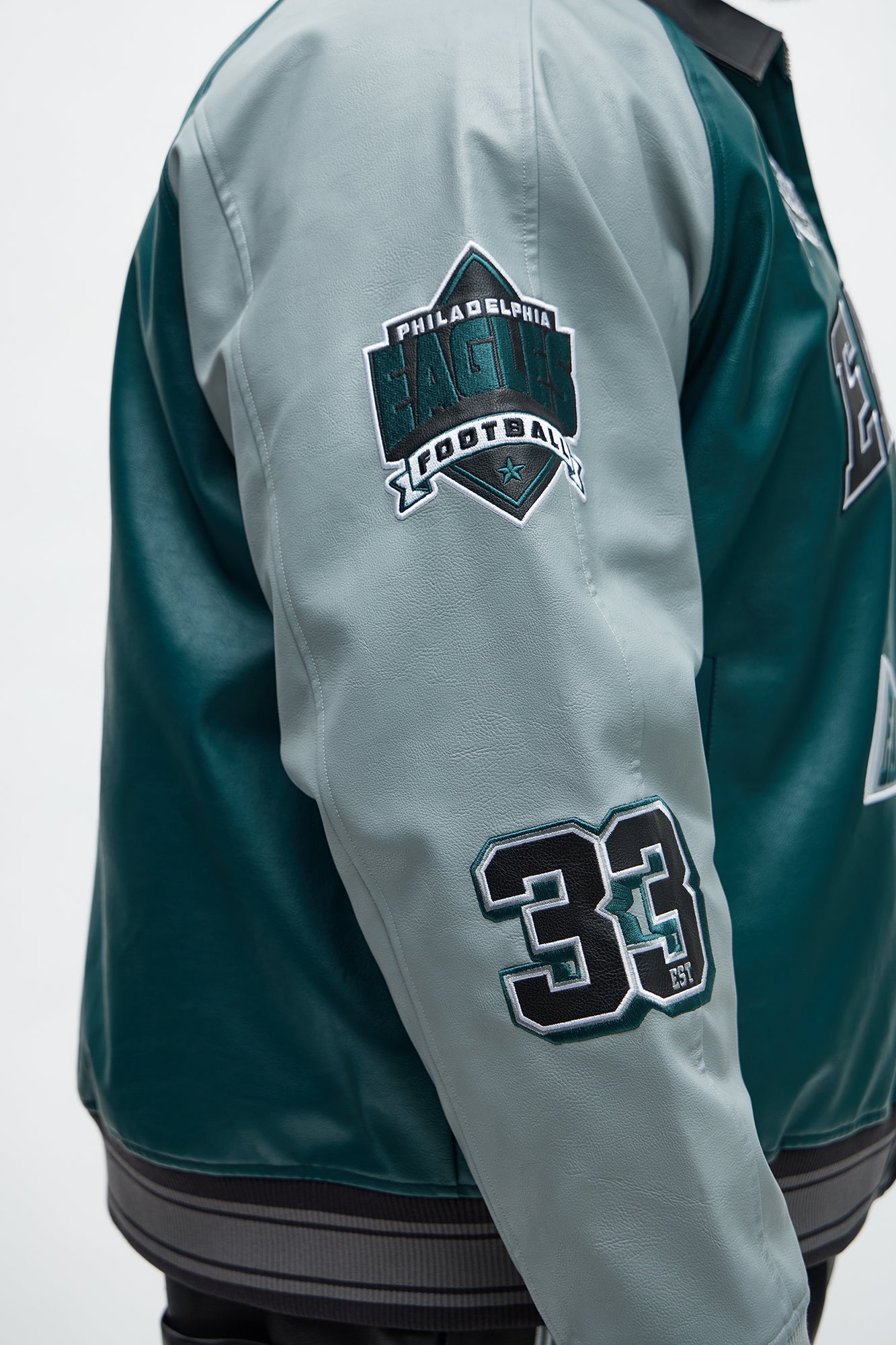 Eagles Marquee Star Faux Patent Leather Long Sleeve Varsity Jacket - Green